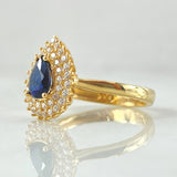 Solitaire Halo Teardrop Ring 4.05gr / Size 7 1/2 / 18K Yellow Gold ©