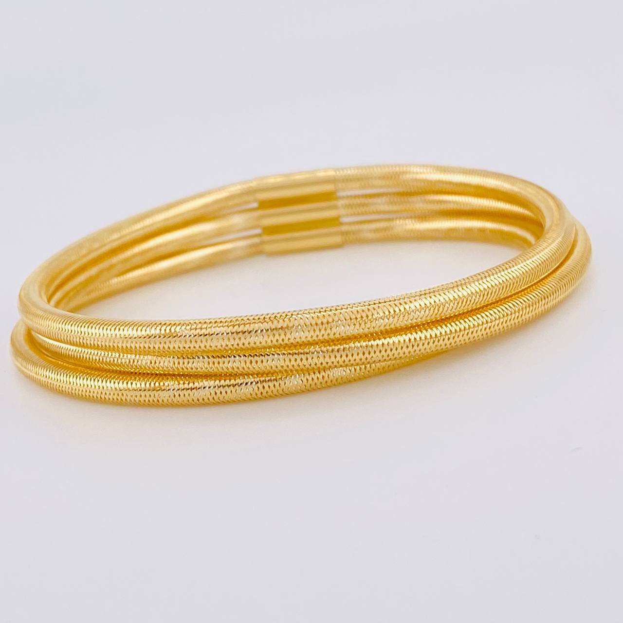Pulso Triple Flex 4.75 g / 7 1/4 in / 9.2 mm Oro Amarillo 18K