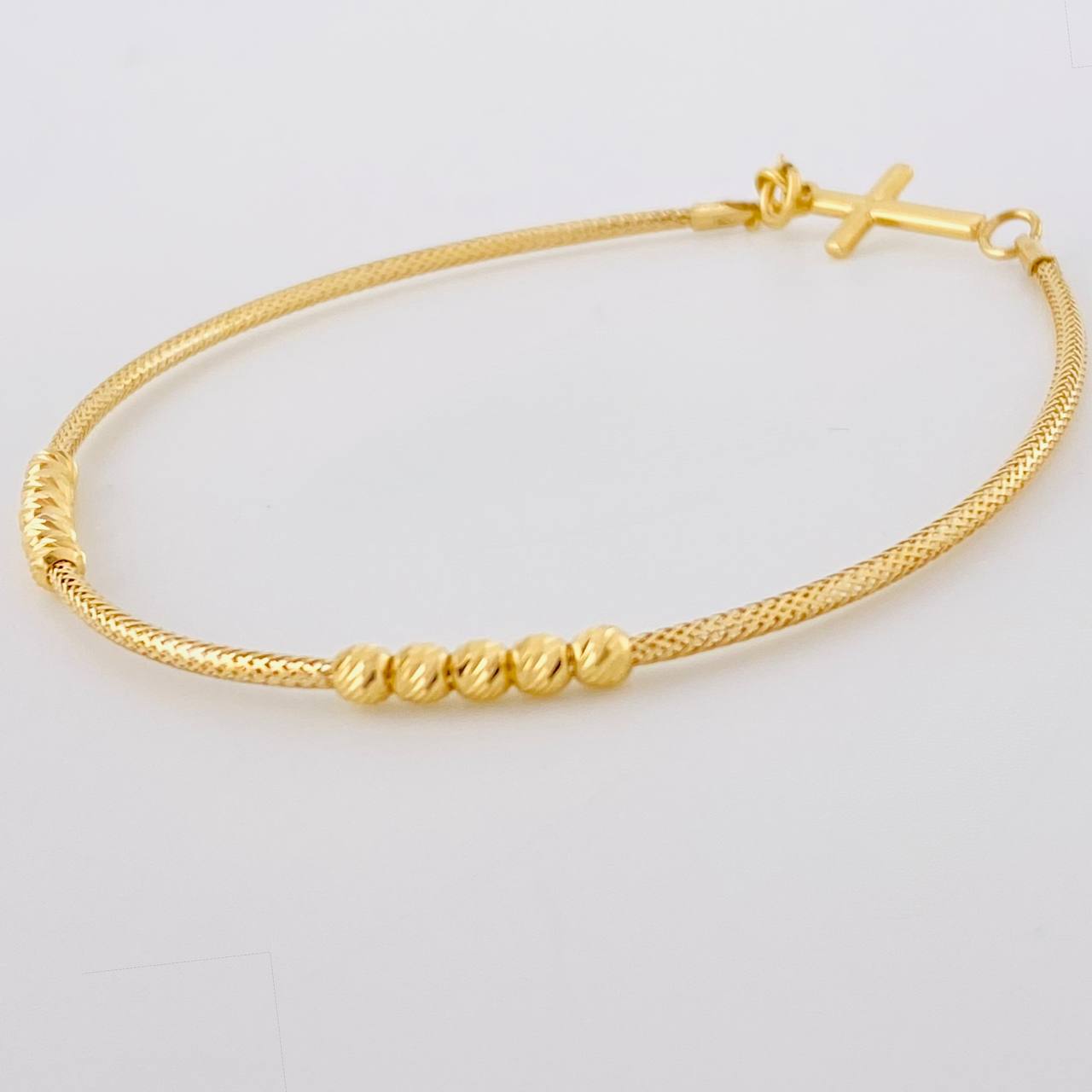 Pulso Flex Cruz Lisa 2.1 g / 7 1/2 in / 1.5 mm Oro Amarillo 18K
