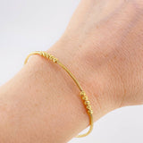 Pulso Flex Cruz Lisa 2.1 g / 7 1/2 in / 1.5 mm Oro Amarillo 18K