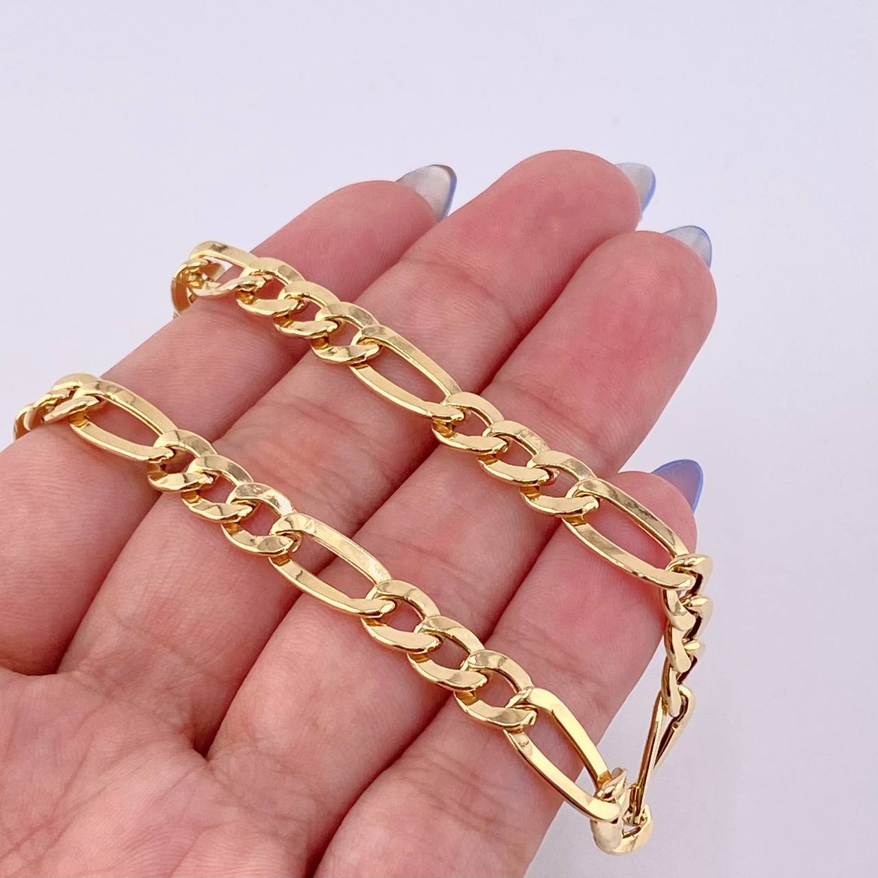 Pulso Figaro 6.2gr / 8 3/4 in / 6.4mm Oro Amarillo +1 18K