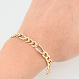 Pulso Figaro 6.1gr / 8 3/4 in / 6.4mm Oro Amarillo +1 18K *