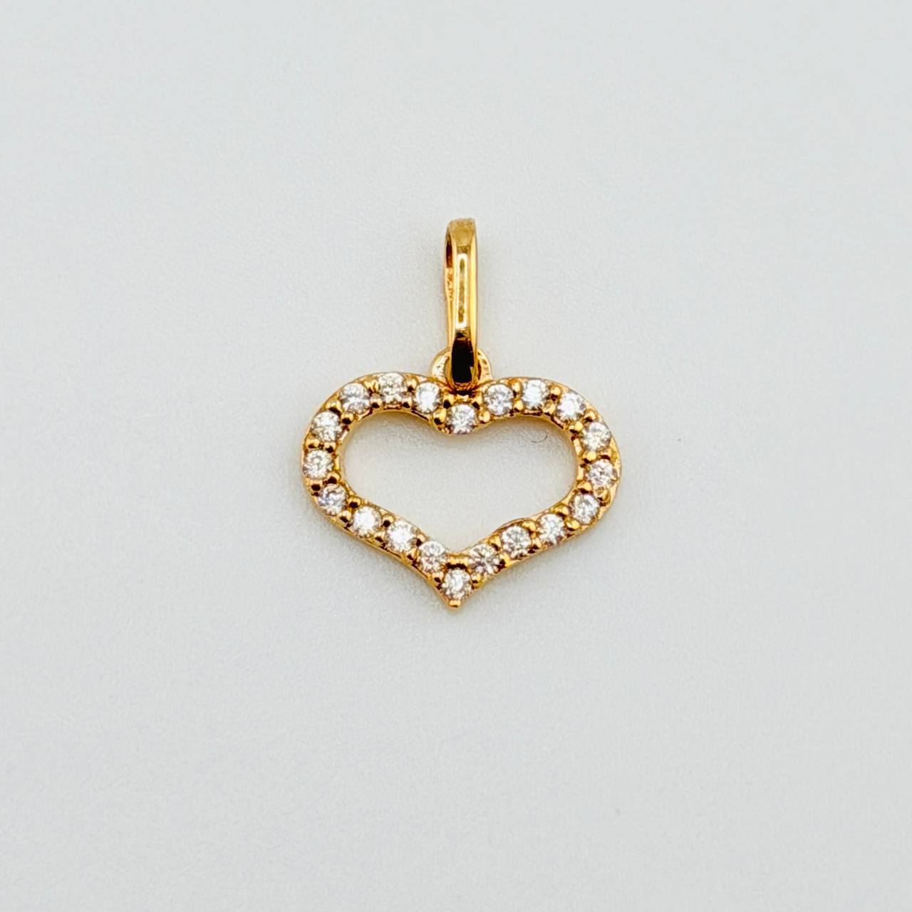 Dije Silueta Corazón Tupido 0.75gr / 1/2 in / Oro Amarillo 18K ©