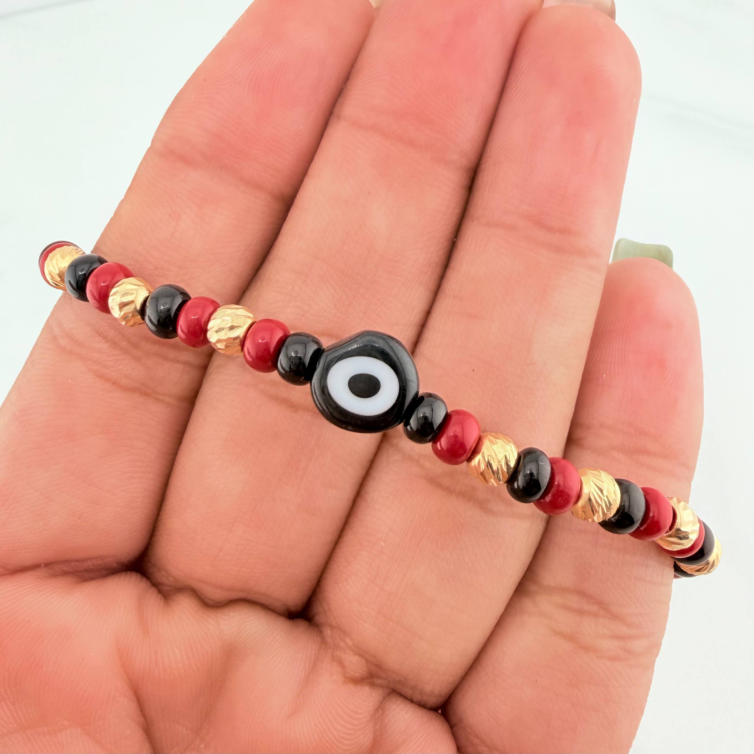 Red Woven Bracelet with Turkish Eye in 18K Yellow Gold