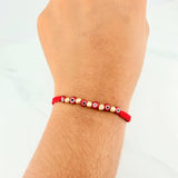 Pulsera Tejida Roja Ojos Turcos Oro Amarillo 18K