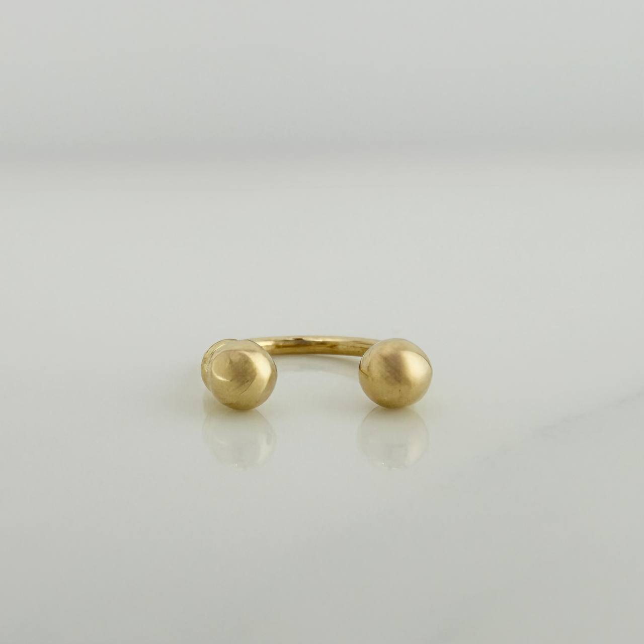 Piercing Curvo Bola 0.4 g / 1/2 in Oro Amarillo 18K