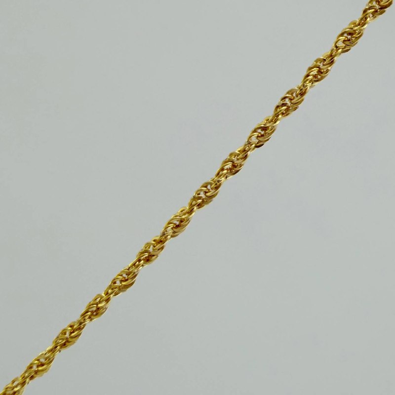 Set Cadena Lazo + Dije Cruz / 1,2 gr / 17 3/4 in Oro Amarillo 18K