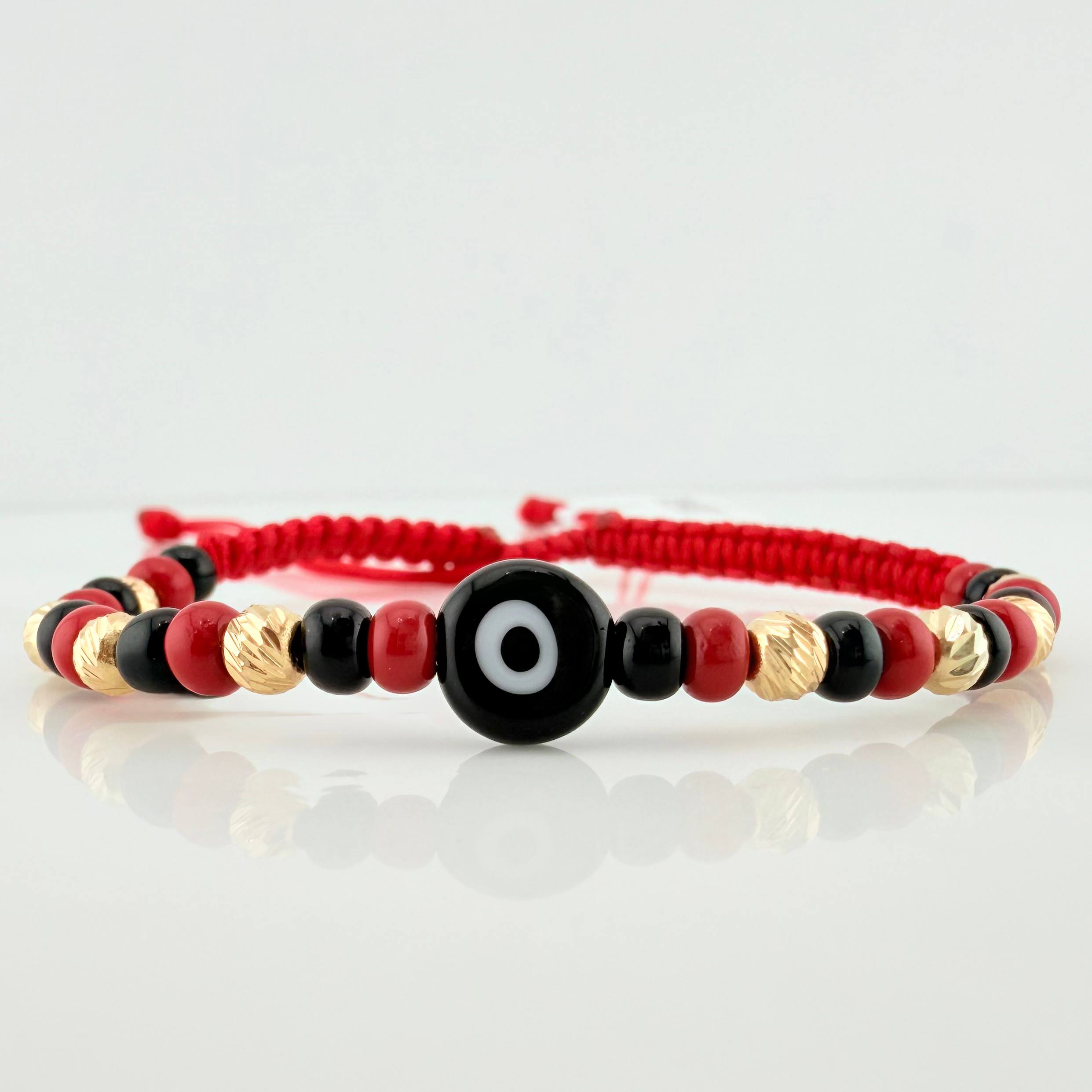 Red Woven Bracelet with Turkish Eye in 18K Yellow Gold