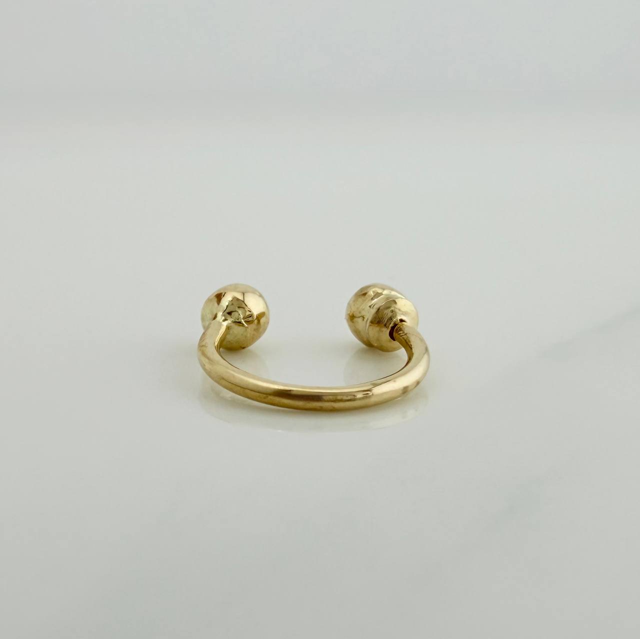 Piercing Curvo Bola 0.4 g / 1/2 in Oro Amarillo 18K