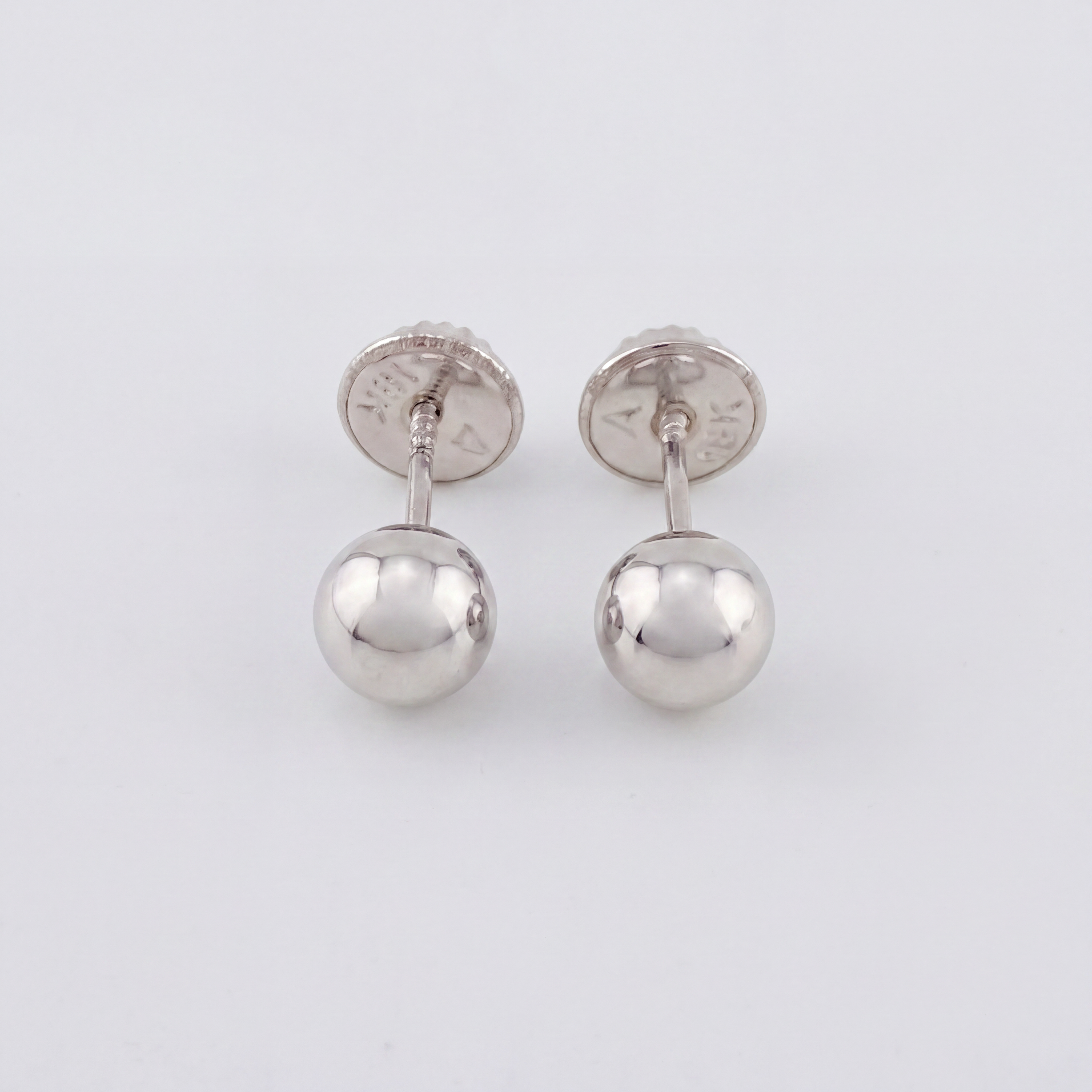 Topos Bola 0.7gr / 6mm Lisa Oro Blanco 18K &