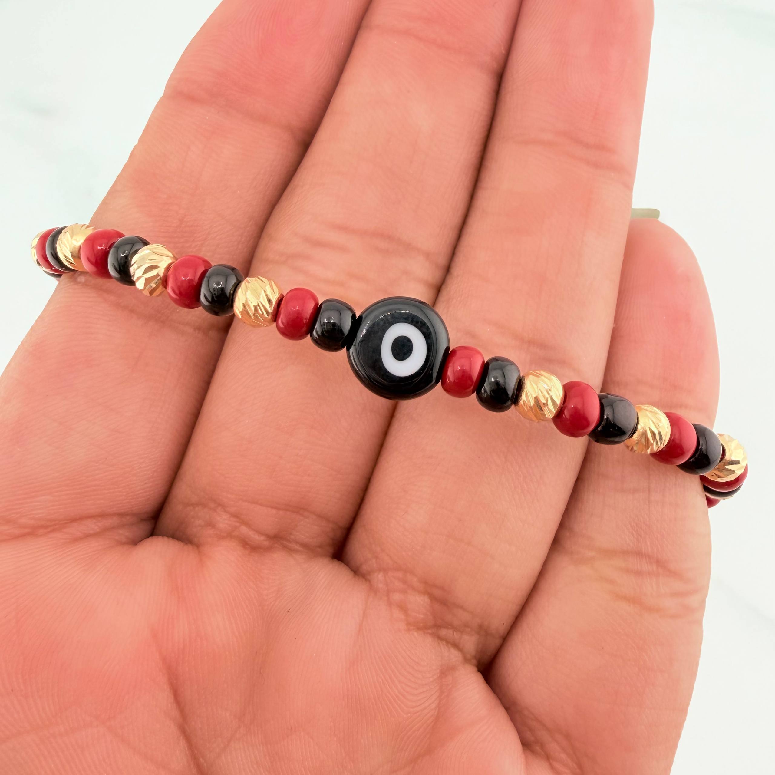 Red Woven Bracelet with Turkish Eye in 18K Yellow Gold