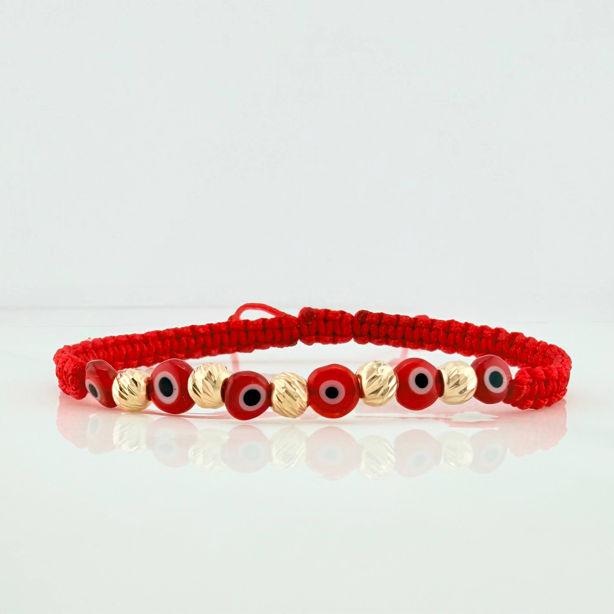 Pulsera Tejida Roja Ojos Turcos Oro Amarillo 18K