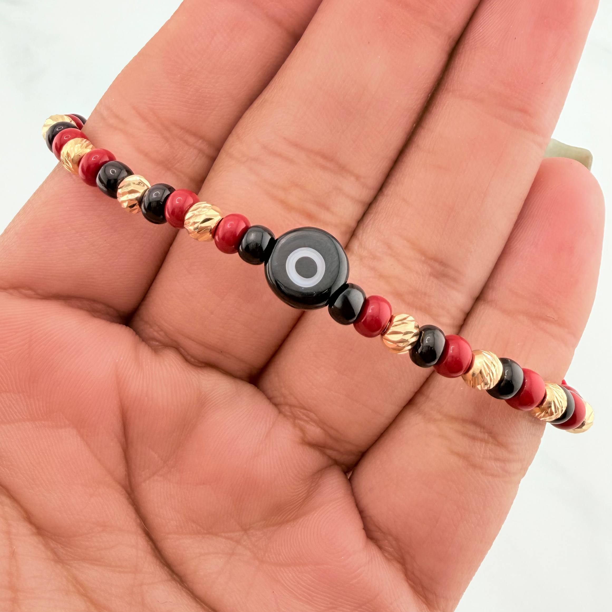 Red Woven Bracelet with Turkish Eye in 18K Yellow Gold