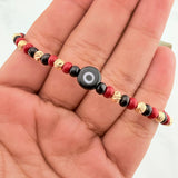 Red Woven Bracelet with Turkish Eye in 18K Yellow Gold