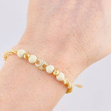 Pulsera Tejida Beige Herraje GC Bolas Lisas Oro Amarillo 18K