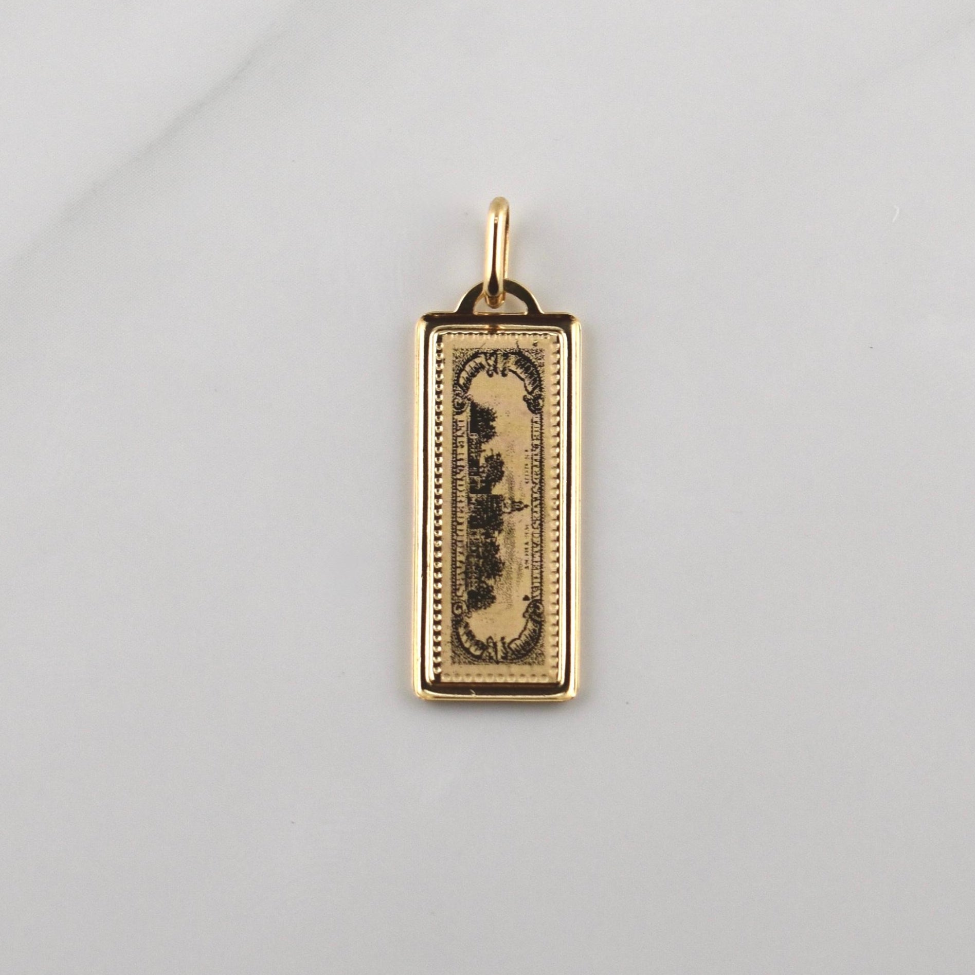 Dije 100 Dolares 1.1gr / 1 1/4 in / Oro Amarillo +4 18K !