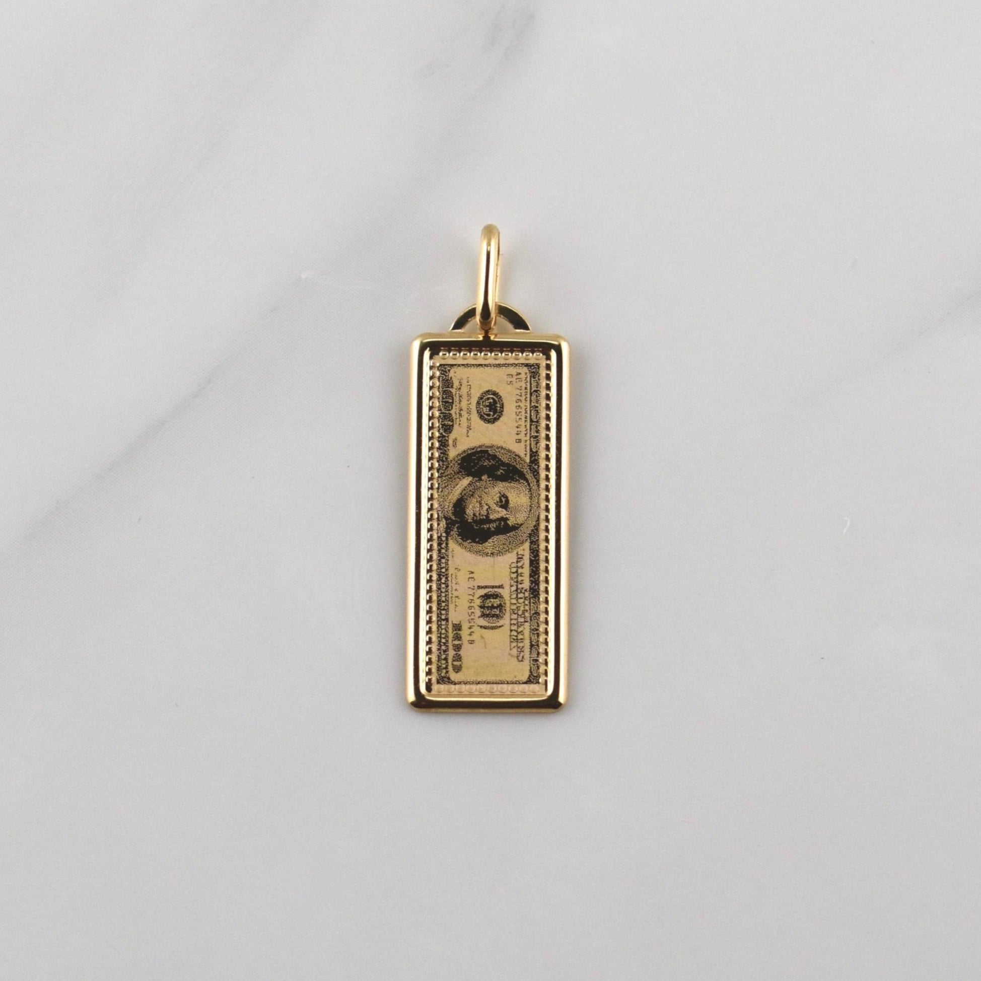 Dije 100 Dolares 1.1gr / 1 1/4 in / Oro Amarillo +4 18K !