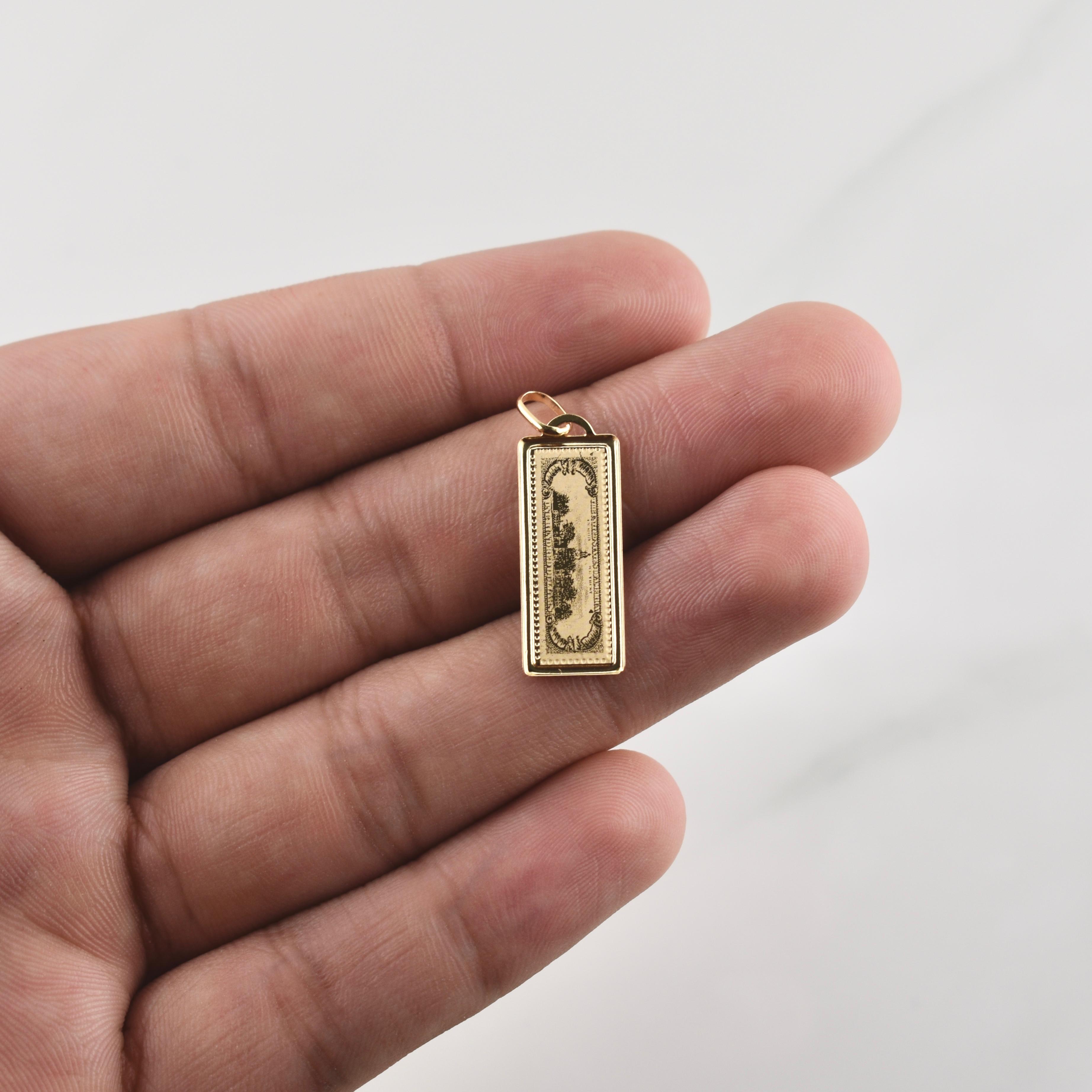 Dije 100 Dolares 1.1gr / 1 1/4 in / Oro Amarillo +4 18K !