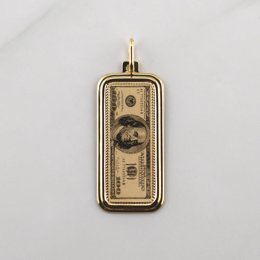 Dije 100 Dolares 2.4gr / 1 1/2 in / Oro Amarillo +4 18K !