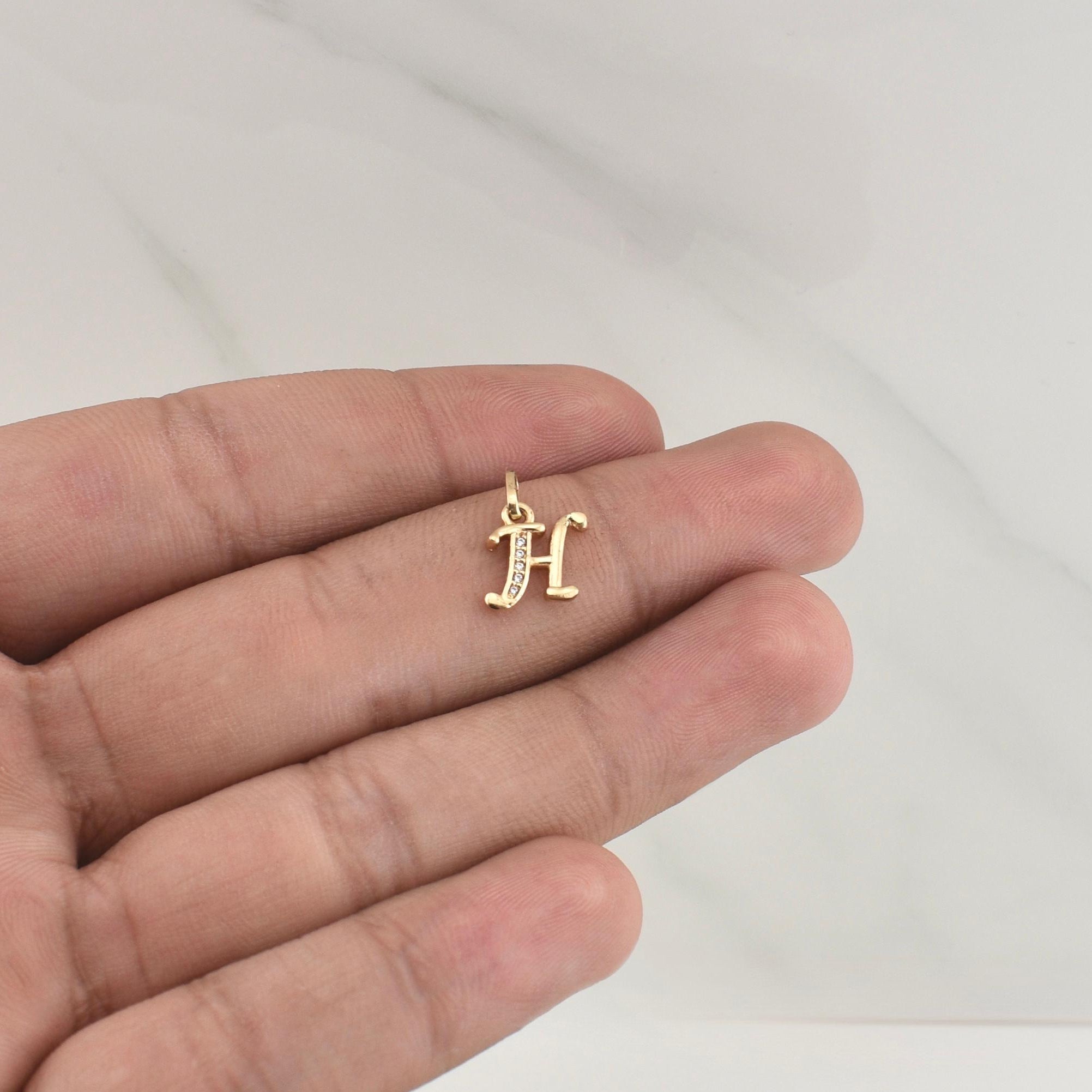 Dije Letra H 0.85gr / 1/2 in / Oro Amarillo 18K !