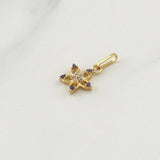 Dije Flor 0.5gr / 1/2 in / Oro Amarillo 18K !