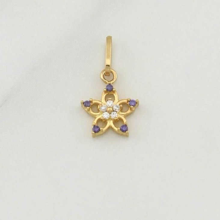 Dije Flor 0.5gr / 1/2 in / Oro Amarillo 18K !