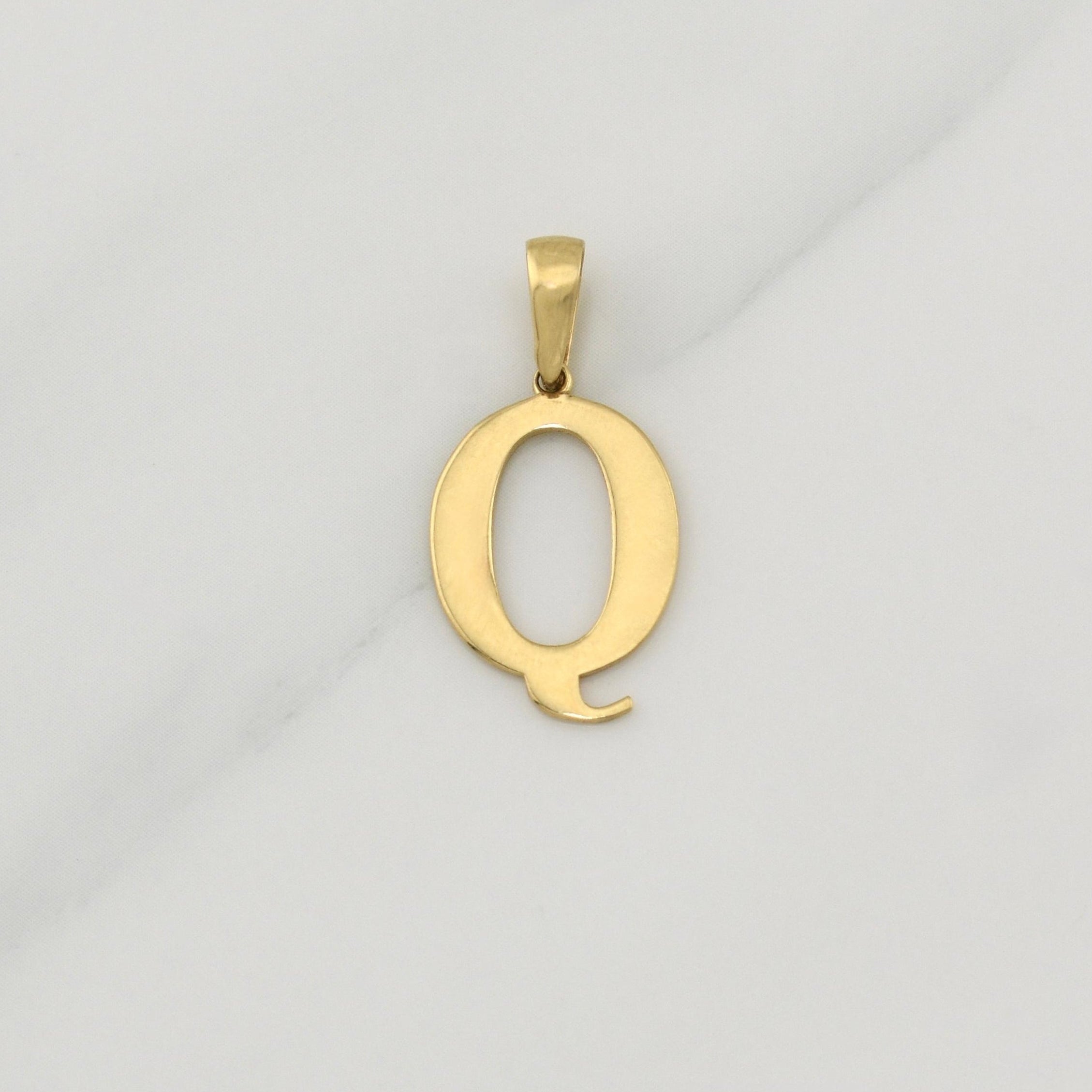 Dije Letra Q 1.45 g / 1 in Oro Amarillo 18K