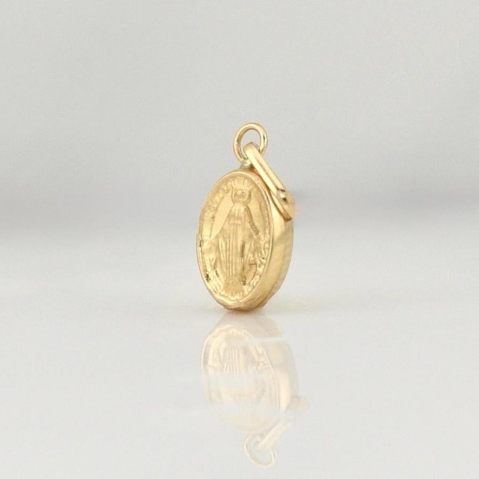 Dije Virgen Milagrosa 0.3 g / 1/2 in Oro Amarillo 18K