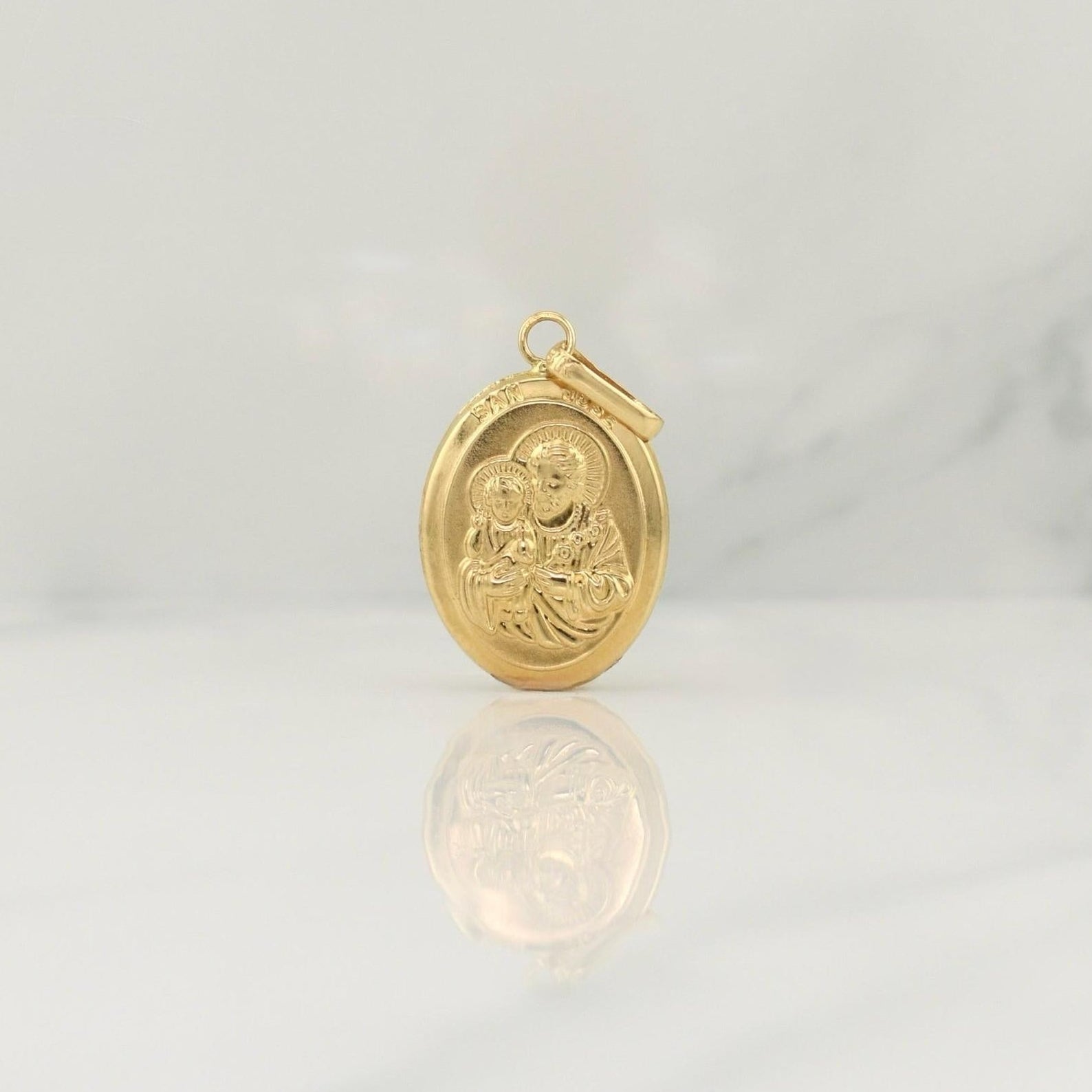Dije San Jose 1.2 g / 1 in Oro Amarillo 18K