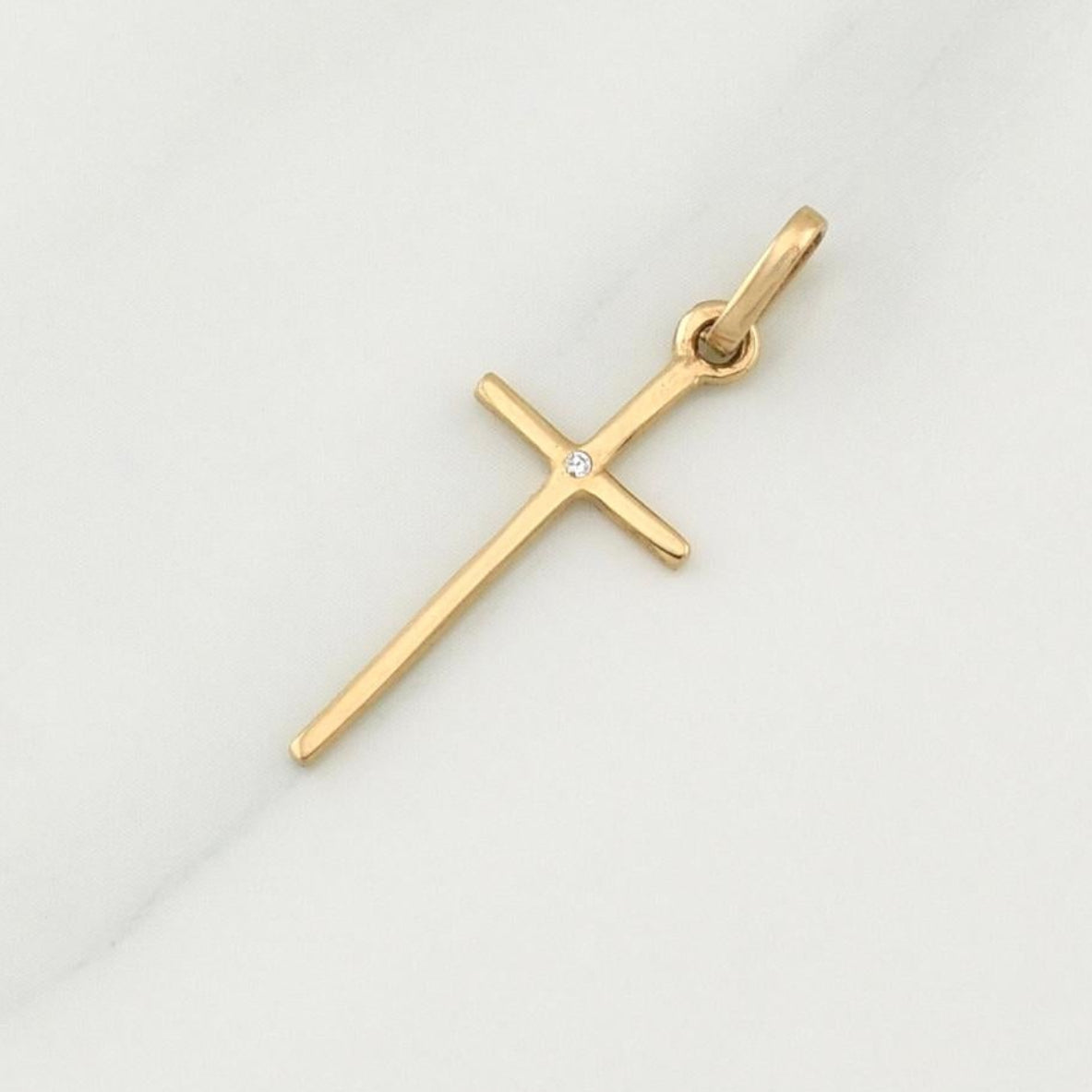 Dije Cruz 0.7 g / 1 in Oro Amarillo 18K