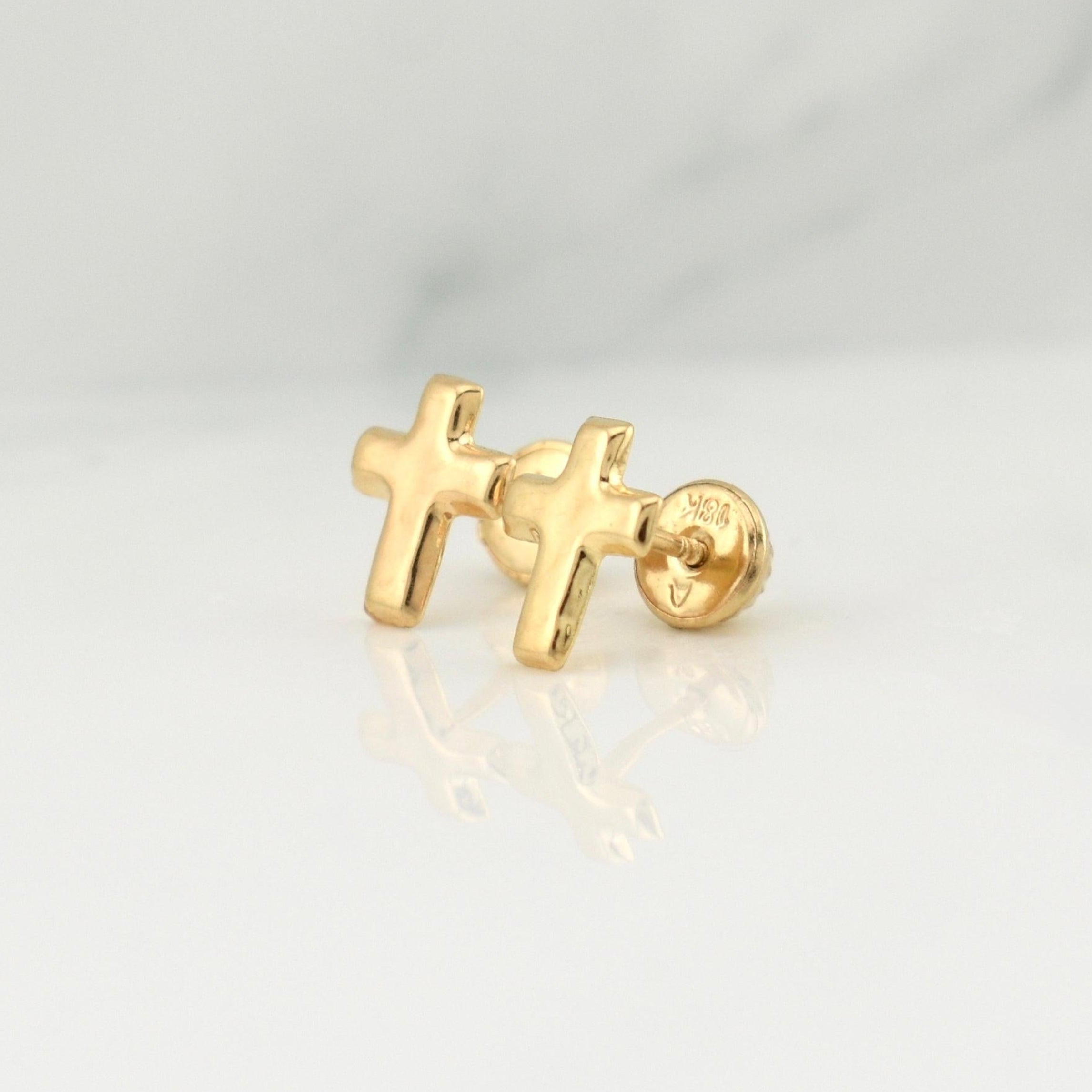 Topos Cruz 0.65 g / in / 9 mm Oro Amarillo 18K
