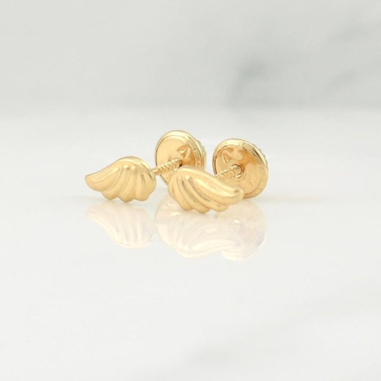 Topos Ala 0.5 g / in / 8 mm Oro Amarillo 18K