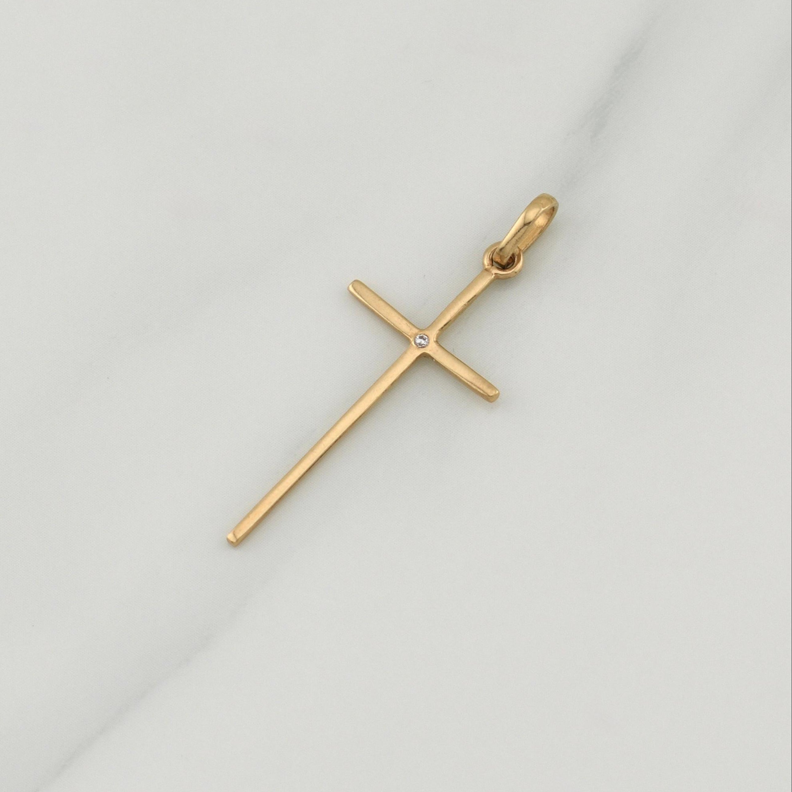 Dije Cruz 0.8 g / 1 1/2 in Oro Amarillo 18K
