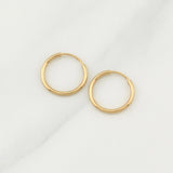 Candongas Aro Liso 0.55 g / 1/2 in Oro Amarillo 18K