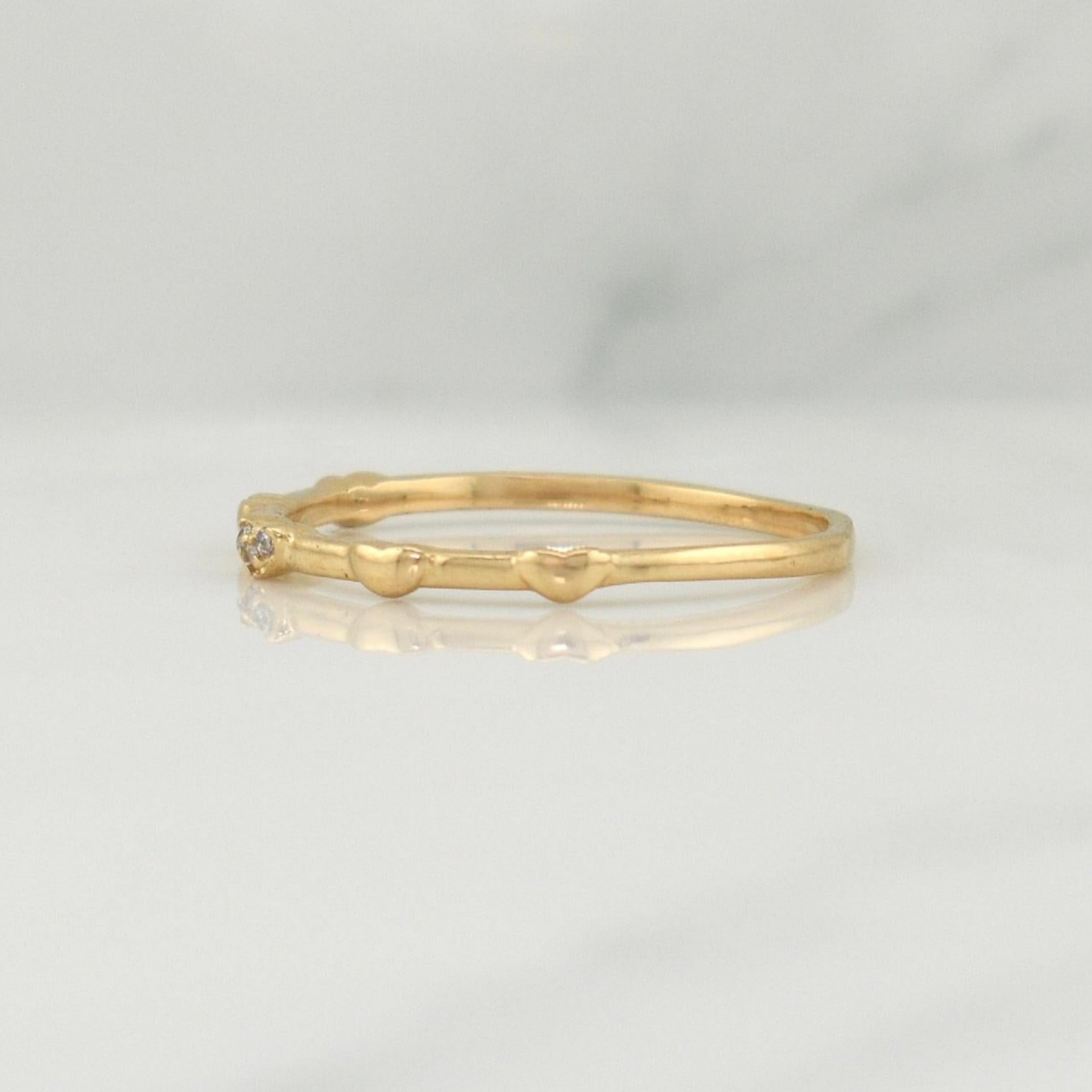 Anillo Mini Corazones 1.45 g / T7,75 Oro Amarillo 18K