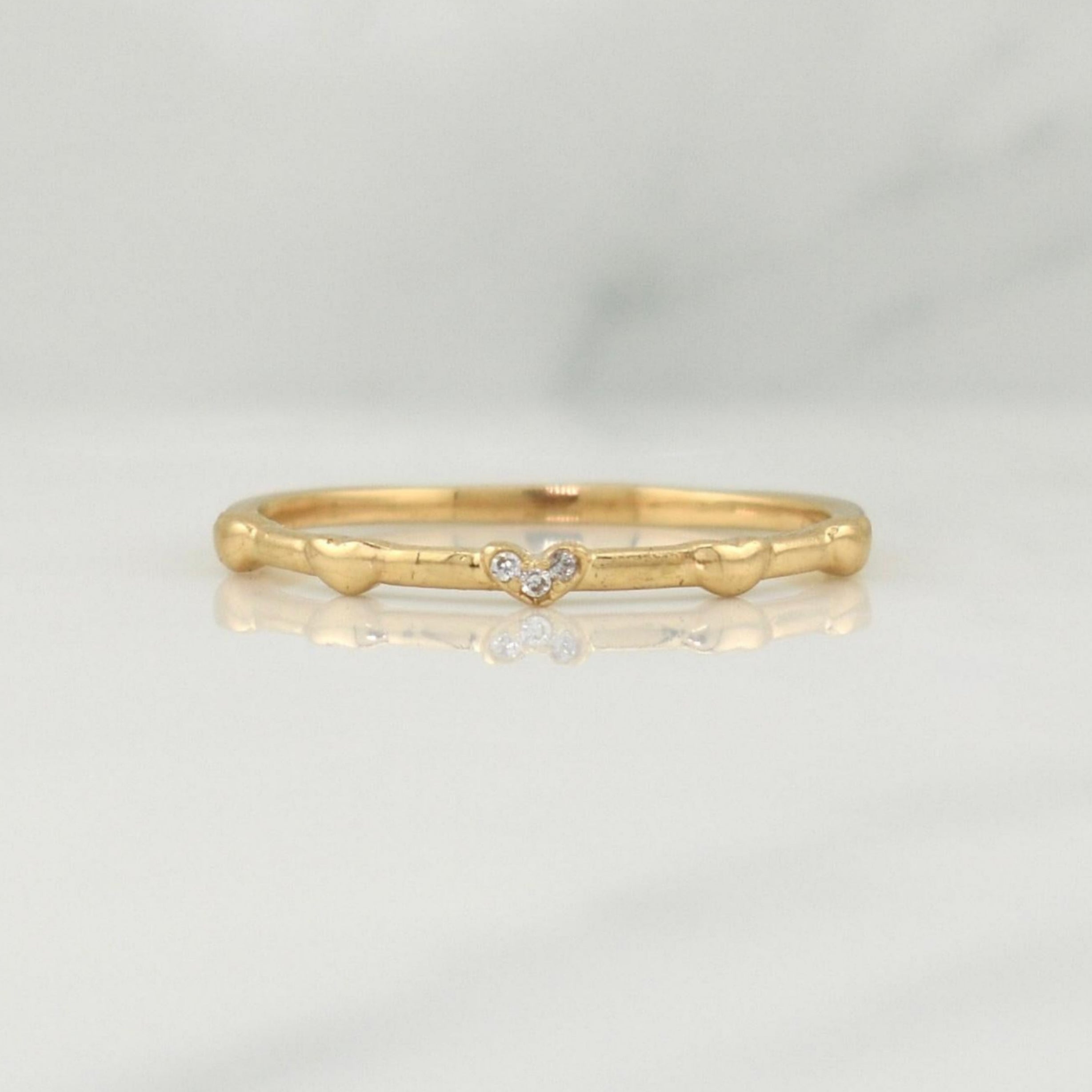 Anillo Mini Corazones 1.45 g / T7,75 Oro Amarillo 18K