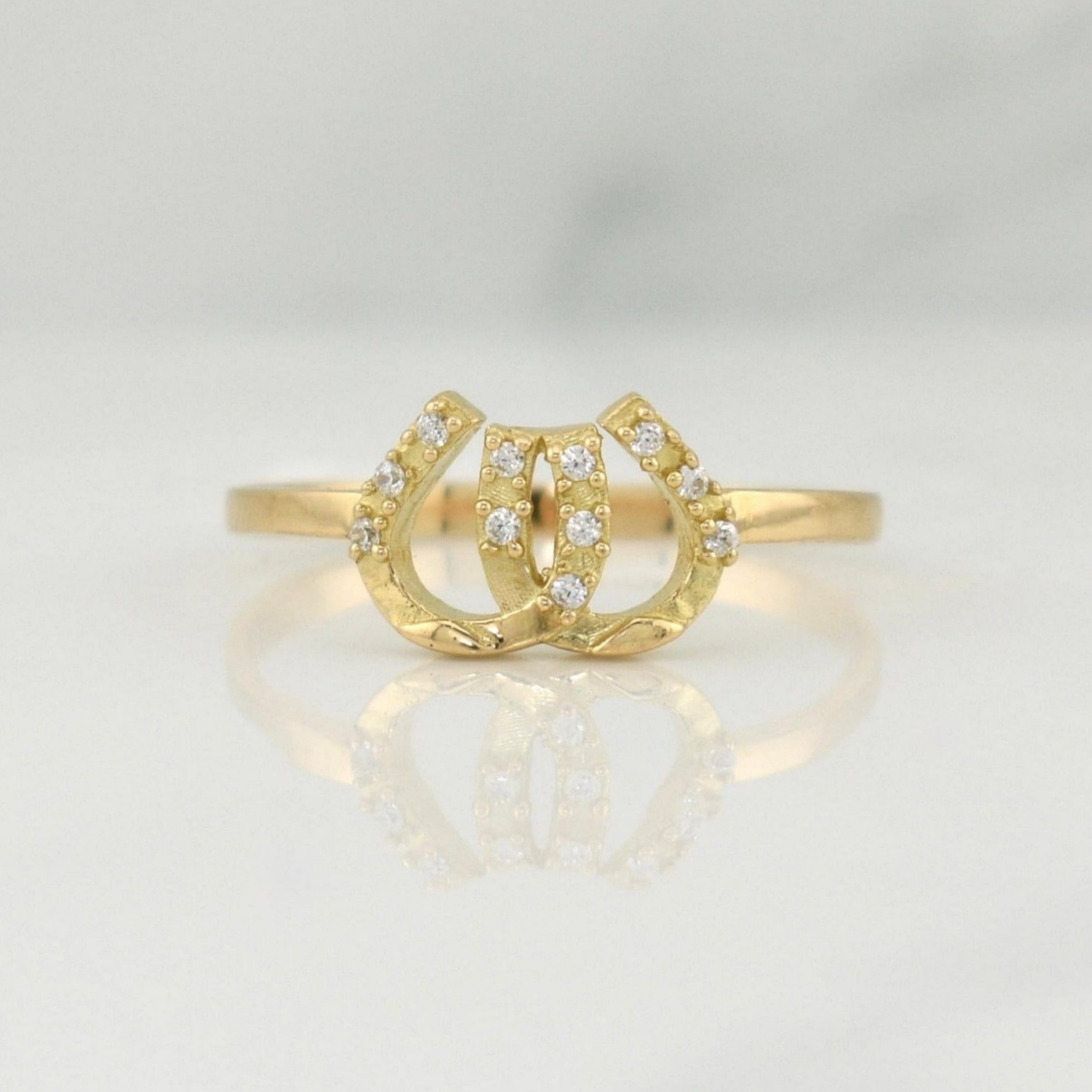Anillo Doble Herradura 1.6 g / T7 Oro Amarillo 18K
