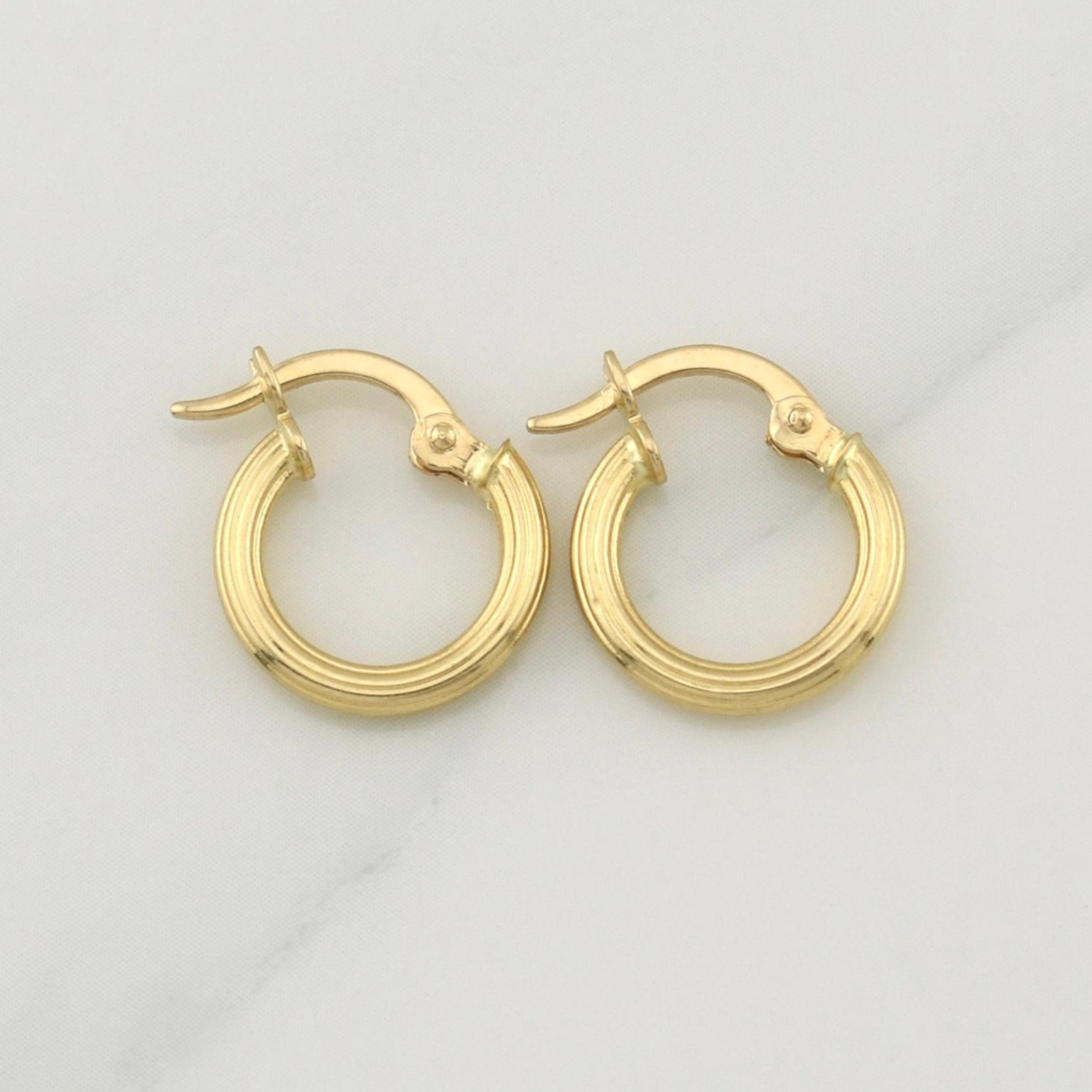 Candongas Cyrene 0.95 g / 1/2 in Oro Amarillo 18K