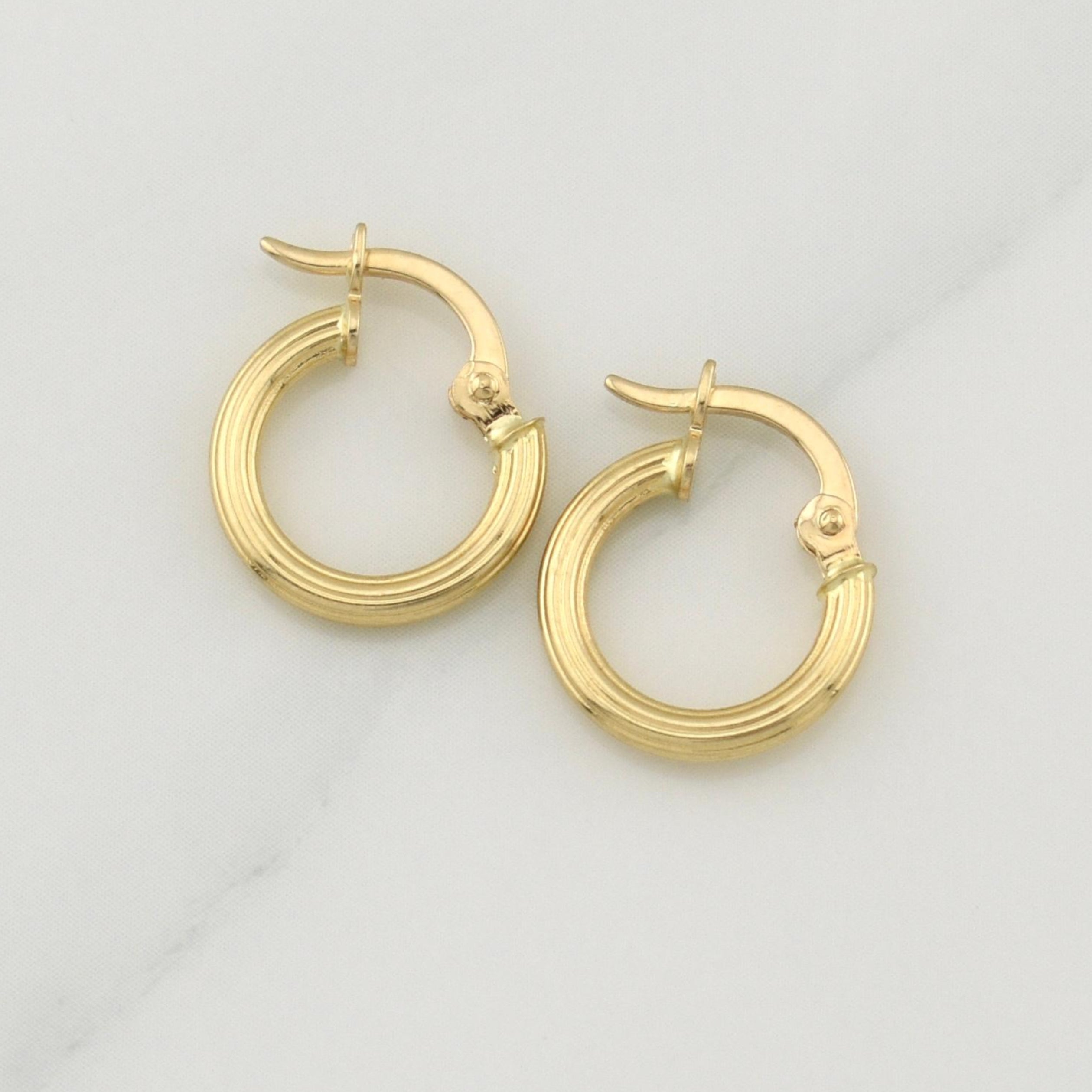 Candongas Cyrene 0.95 g / 1/2 in Oro Amarillo 18K
