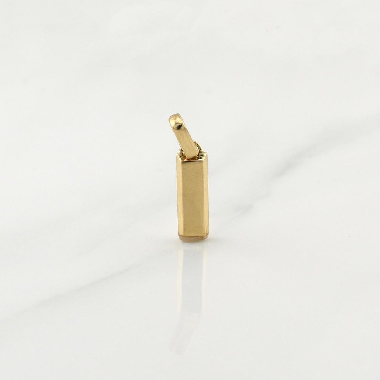 Dije Lingote 1.25gr / 3/4 in / Oro Amarillo 18K !