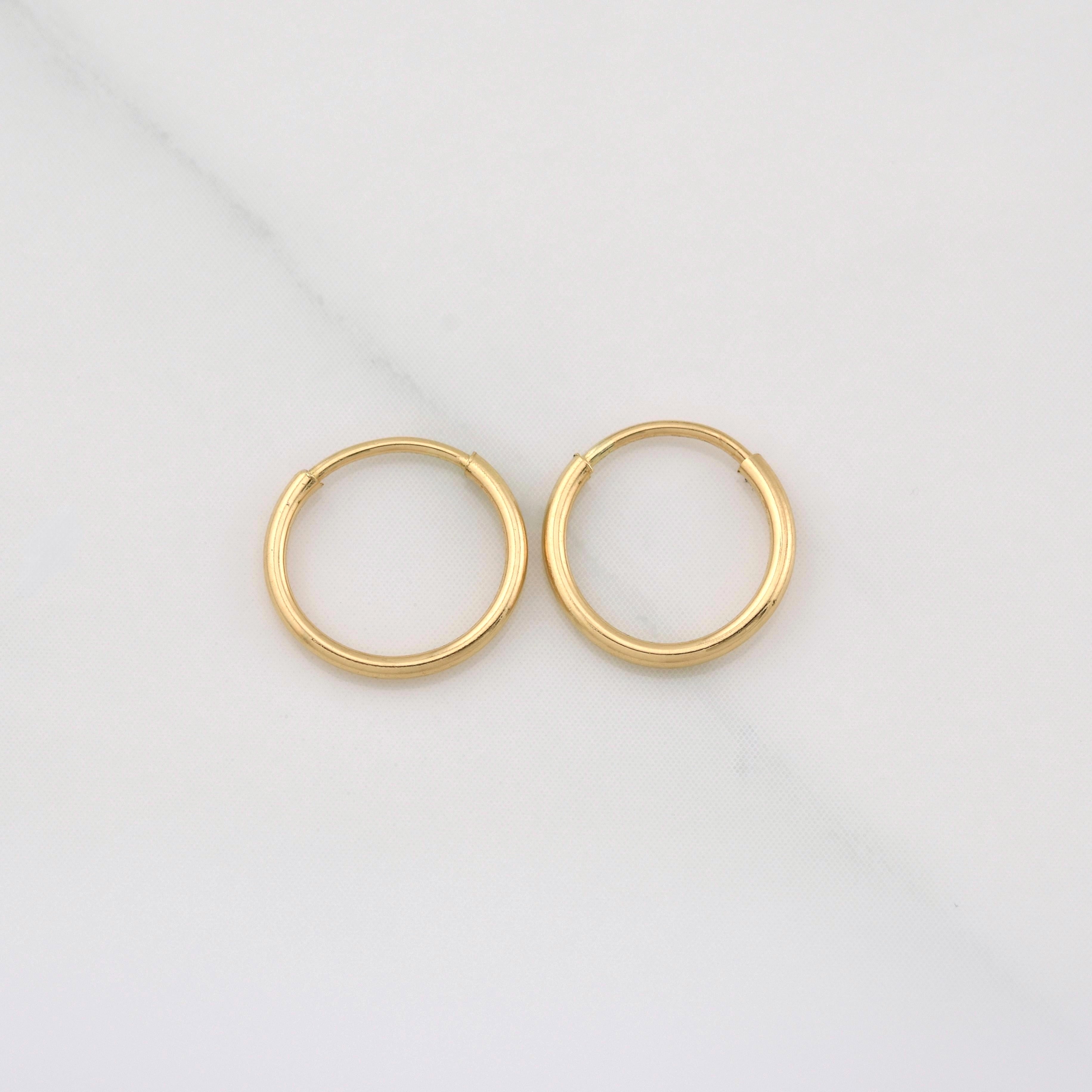 Candongas Aro Liso 0.35g / 1/4 in Oro Amarillo 18K