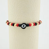 Red Woven Bracelet with Turkish Eye in 18K Yellow Gold