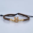 Pulsera Tejida Negra Beige Corona 2.15gr / Oro 18K $