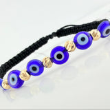 Black Woven Bracelet with Blue Evil Eye Charms in 18K Yellow Gold