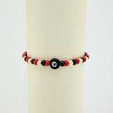 Red Woven Bracelet with Turkish Eye in 18K Yellow Gold