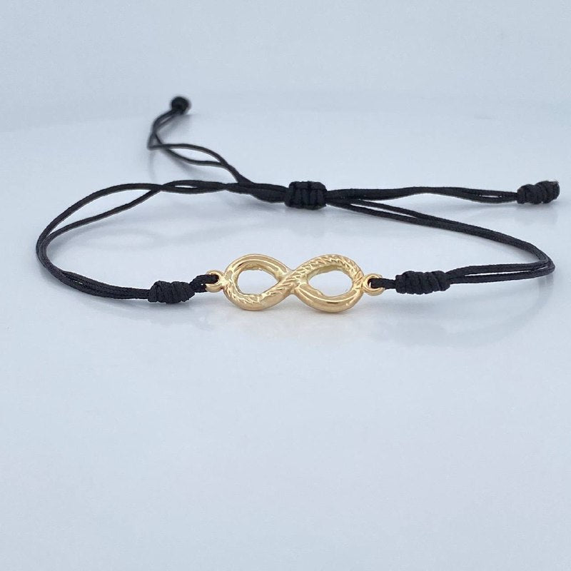 Pulsera Tejida Negra Infinito. 1.15gr / Oro 18K &