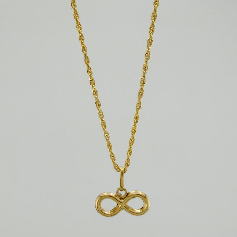 Set Cadena Lazo + Dije Infinito / 1,35 gr / 18 in Oro Amarillo 18K
