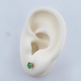 Topos Cuatro Garras Esmeralda 0.95gr / Oro Amarillo 18K +