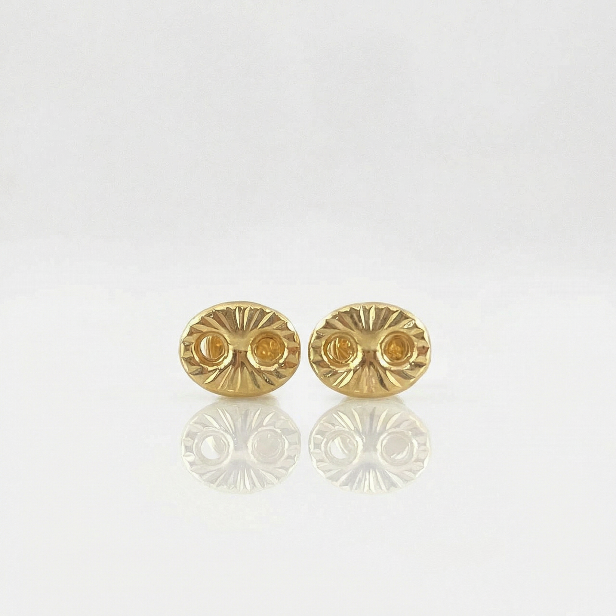 Stud Earrings GC 0.5gr / 18K Yellow Gold