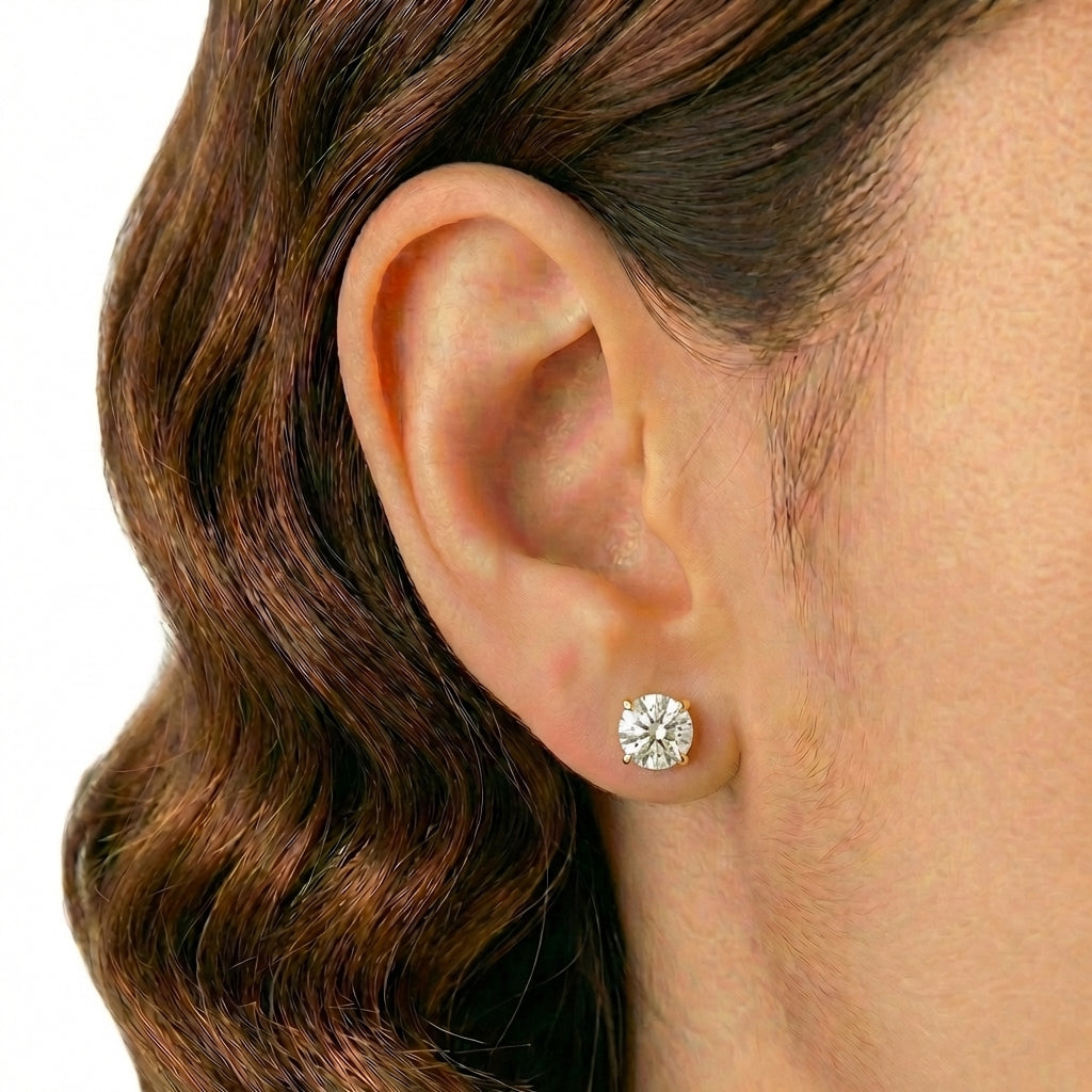 Four-prong Stud Earrings 1.4gr / 5.3 mm 18K Yellow Gold ©